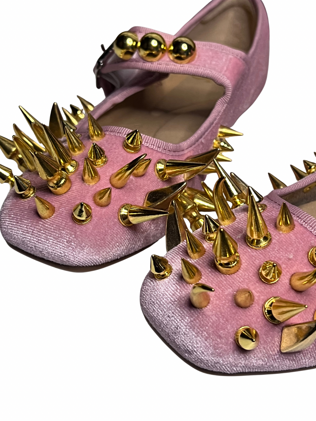 Pink spiked ballet flats