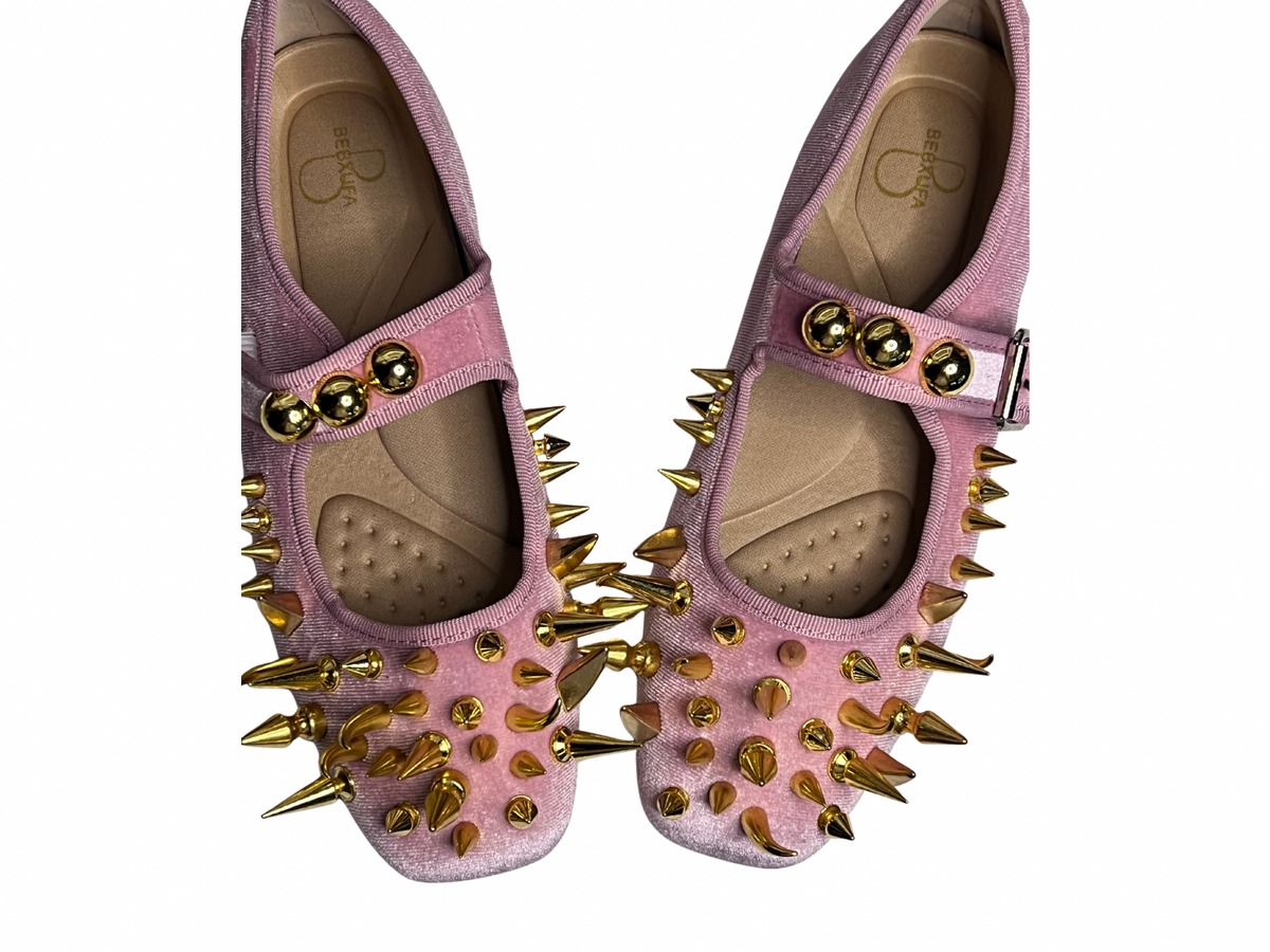 Pink spiked ballet flats